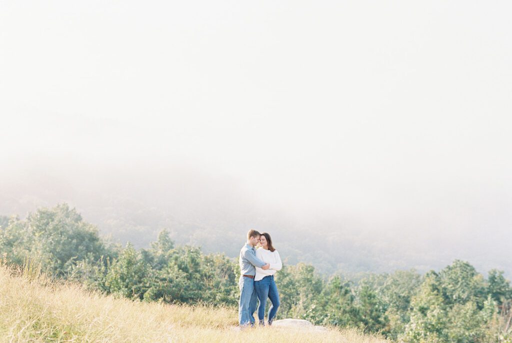 A magical engagement session on a foggy morning at Weathington Park in Section, Alabama with Daniel and Shelby.