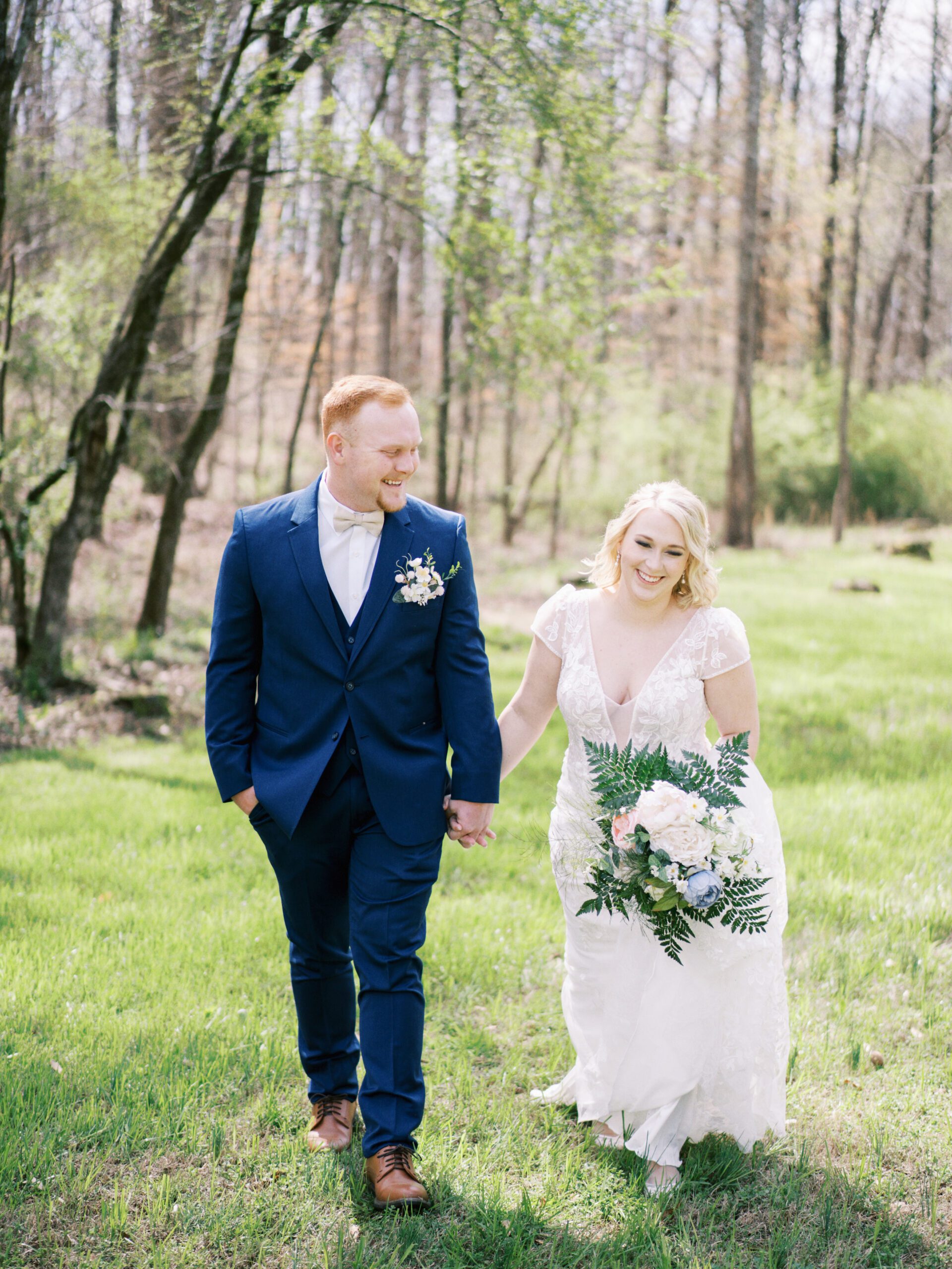 The bride and groom outside on a spring day at Dry Creek Chapel in Leesburg, Alabama